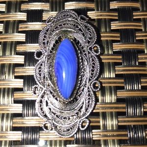 Sterling silver pendant with blue Stone.